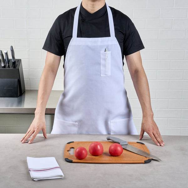 Restaurantware Chef 101 White Standard Bib Apron - With 3 Pockets - 32 1/2'' X 27 1/2'' - 100 Count Box