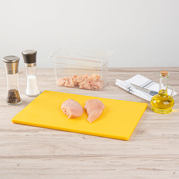 Restaurantware Chef 101 Yellow Plastic Cutting Board - 18" X 12" - 10 Count Box