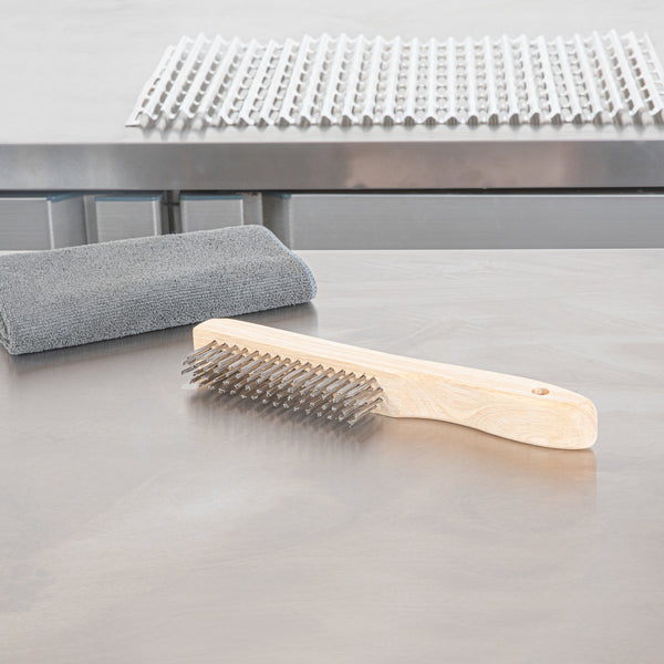 Restaurantware Clean Tek Professional 10 1/4" Stainless Steel Wire Bristle Grill / Oven Brush - With Curved Handle - 1 Count Box
