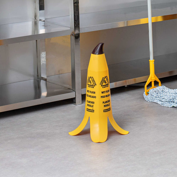 Restaurantware Clean Tek Professional Yellow Plastic Banana Wet Floor Cone - Multilingual With Brown Stem - 23 1/2" - 6 Count Box