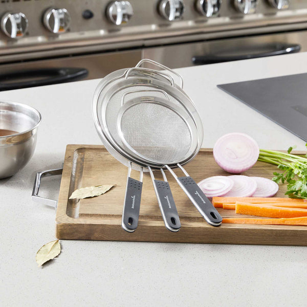 Restaurantware Comfy Grip 3-Piece Round Stainless Steel Extra Fine Mesh Strainer Set - With Silicone Handle - 1 Count Box