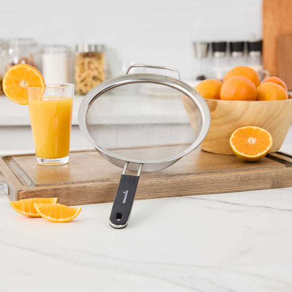 Restaurantware Comfy Grip Round Stainless Steel Extra Fine Mesh Strainer - With Silicone Handle - 7 3/4" - 1 Count Box