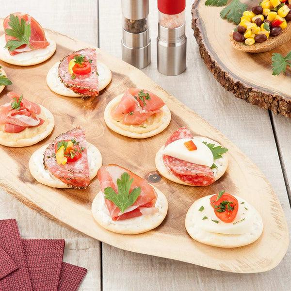 Restaurantware Eco Display Oval Natural Acacia Serving Board - Varnished - 20" X 8" X 3/4" - 1 Count Box