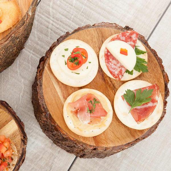 Restaurantware Eco Display Round Natural Acacia Medium Riser - Varnished Bark Edges - 6" X 6" X 3" - 1 Count Box