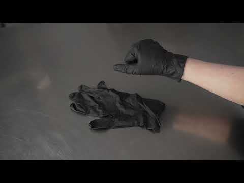 Restaurantware Fashion Serve Black Plastic Medium Nitrile Gloves - Powder Free - 9" X 3 3/4" - 100 Count Box