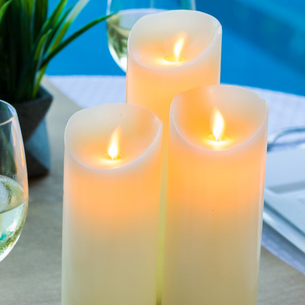 Restaurantware Fire Tek Ivory Plastic Flameless Pillar Candle - Real Wax Programmable - 3" X 3" X 7" - 10 Count Box