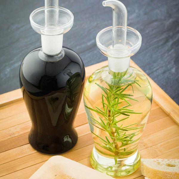 Restaurantware Forma Professional 9 Oz Round Oil Dispenser Bottle - Blown Glass - 2 3/4" X 2 3/4" X 6 1/4" - 1 Count Box