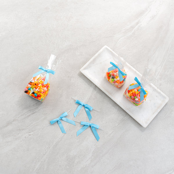 Restaurantware Gift Tek Light Blue Polyester Satin Twist Tie Bow - Pre-Tied - 3" X 2 1/2" - 4000 Count Box