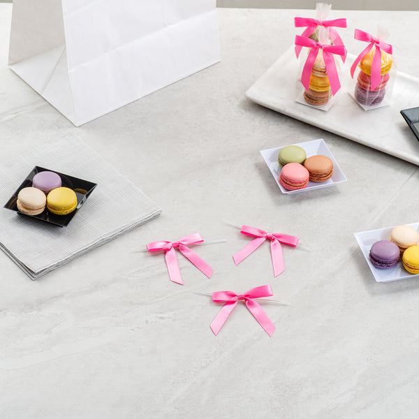 Restaurantware Gift Tek Pink Polyester Satin Twist Tie Bow - Pre-Tied - 3" X 2 1/2" - 4000 Count Box