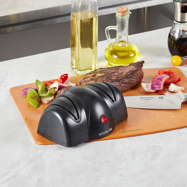 Restaurantware Kitchen Tek Black Plastic 2 Stage Electric Knife Sharpener - For Straight Edge Knives 120V - 7 1/2'' X 5 3/4'' X 3 3/4'' - 1 Count Box