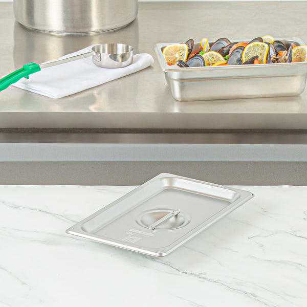 Restaurantware Kitchen Tek Stainless Steel Lid - Fits 1/4 Size Steam Table Pan - 12 Count Box