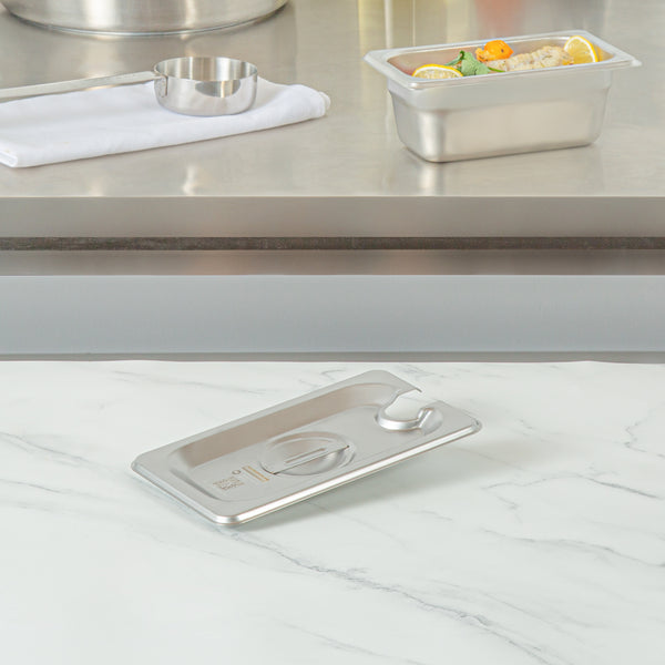 Restaurantware Kitchen Tek Stainless Steel Slotted Lid - Fits 1/9 Size Steam Table Pan - 12 Count Box