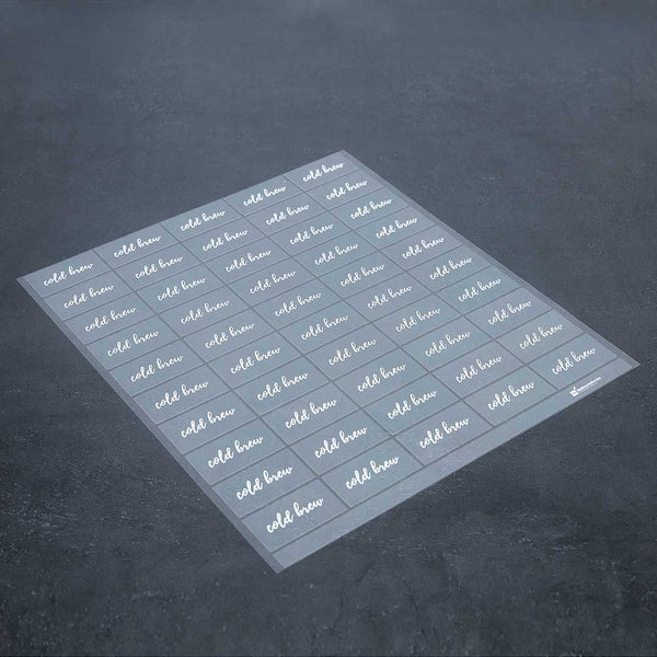 Restaurantware Label Tek Plastic Cold Brew Label - Clear With White Font Water-Resistant - 2" X 1" - 100 Count Box