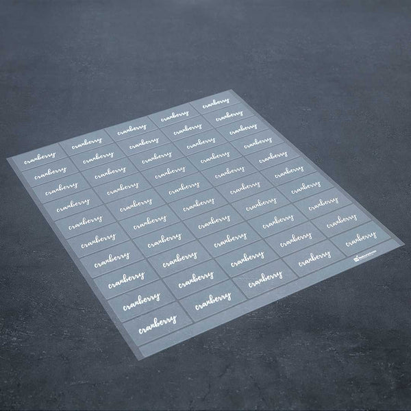 Restaurantware Label Tek Plastic Cranberry Label - Clear With White Font Water-Resistant - 2" X 1" - 100 Count Box