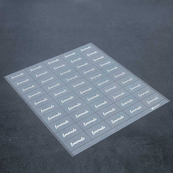 Restaurantware Label Tek Plastic Lemonade Label - Clear With White Font Water-Resistant - 2" X 1" - 100 Count Box