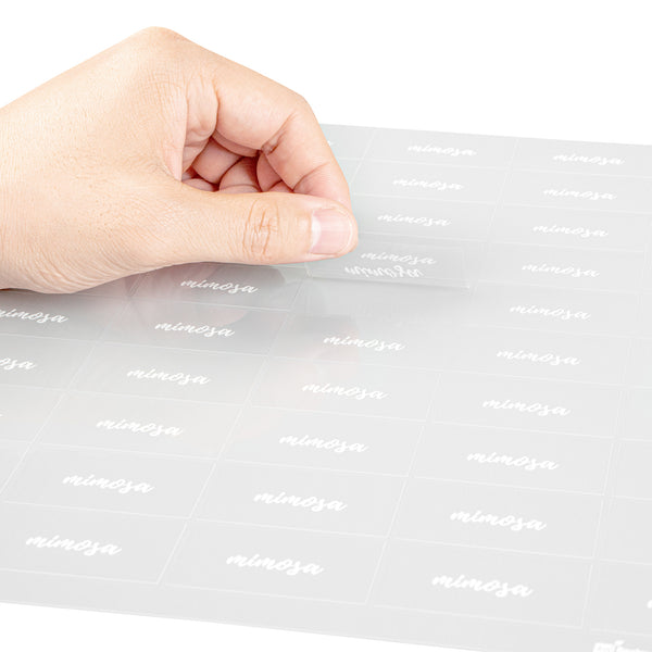 Restaurantware Label Tek Plastic Mimosa Label - Clear With White Font Water-Resistant - 2" X 1" - 100 Count Box