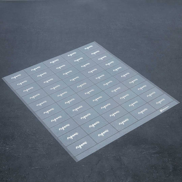 Restaurantware Label Tek Plastic Organic Label - Clear With White Font Water-Resistant - 2" X 1" - 100 Count Box