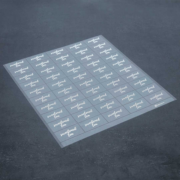 Restaurantware Label Tek Plastic Sweetened Tea Label - Clear With White Font Water-Resistant - 2" X 1" - 100 Count Box