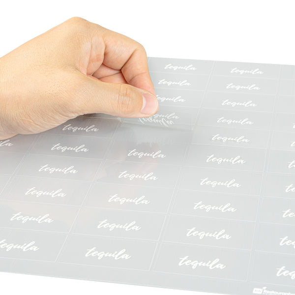 Restaurantware Label Tek Plastic Tequila Label - Clear With White Font Water-Resistant - 2" X 1" - 100 Count Box