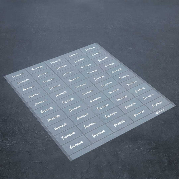 Restaurantware Label Tek Plastic Turmeric Label - Clear With White Font Water-Resistant - 2" X 1" - 100 Count Box