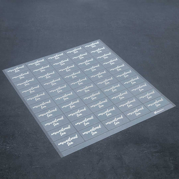 Restaurantware Label Tek Plastic Unsweetened Tea Label - Clear With White Font Water-Resistant - 2" X 1" - 100 Count Box