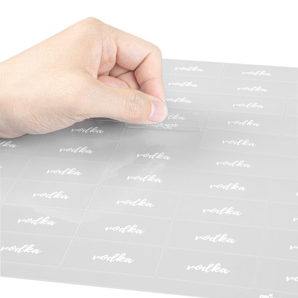 Restaurantware Label Tek Plastic Vodka Label - Clear With White Font Water-Resistant - 2" X 1" - 100 Count Box