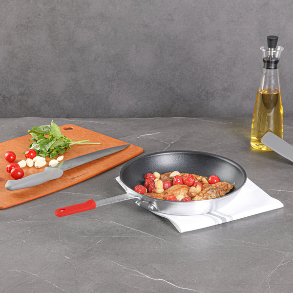 Restaurantware Met Lux 1 Aluminum 10" Non-Stick Fry Pan And 1 Red Silicone Pan Handle Sleeve