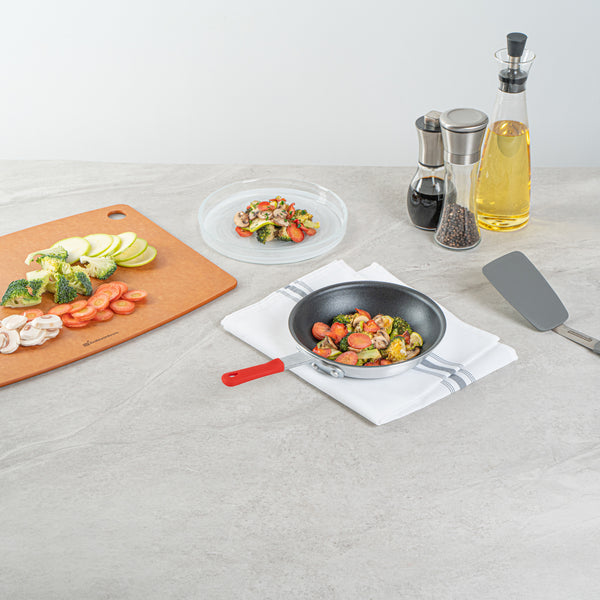 Restaurantware Met Lux 1 Aluminum 7" Non-Stick Fry Pan And 1 Red Silicone Pan Handle Sleeve