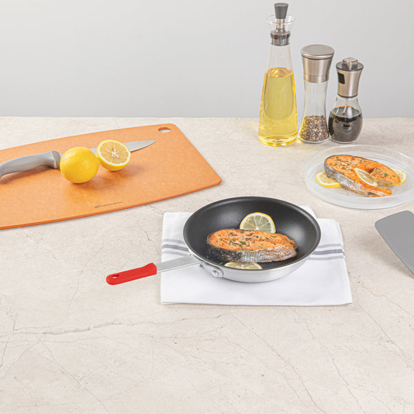 Restaurantware Met Lux 1 Aluminum 9" Non-Stick Fry Pan And 1 Red Silicone Pan Handle Sleeve