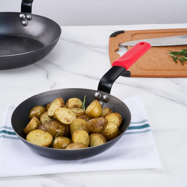 Restaurantware Met Lux 1 Black Carbon Steel 9" Pre-Seasoned Fry Pan And 1 Red Silicone Pan Handle Sleeve