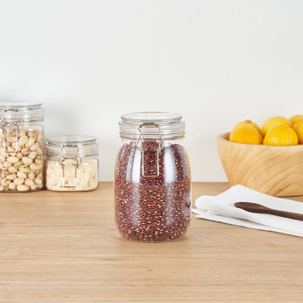 Restaurantware Met Lux 39 Oz Round Clear Plastic Storage Jar - With Hinged Lid - 4 1/4" X 4 1/4" X 7" - 20 Count Box