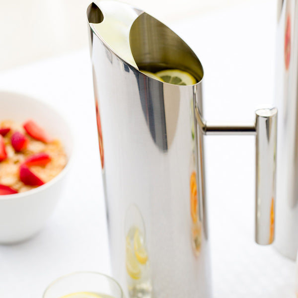 Restaurantware Met Lux 50 Oz Round Polished Stainless Steel Water Pitcher - 3 1/2" X 3 1/2" X 11 3/4" - 1 Count Box