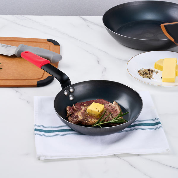 Restaurantware Met Lux 6 Black Carbon Steel 8" Pre-Seasoned Fry Pans And 6 Red Silicone Pan Handle Sleeves