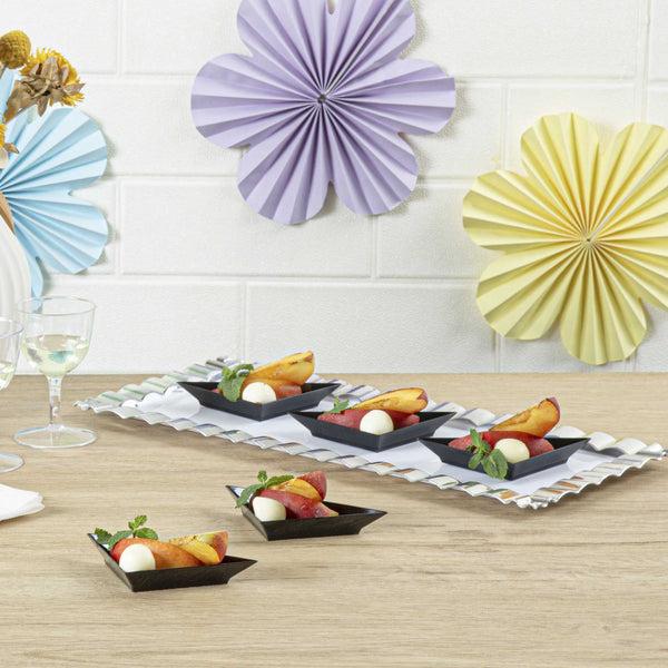 Restaurantware Mini Serve Black Plastic Mini Triangolo Appetizer Plate - 4" X 2" - 100 Count Box