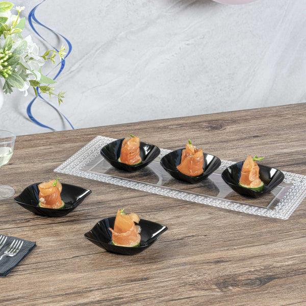 Restaurantware Mini Serve Square Black Plastic Comma Plate - 3 1/2" X 4 1/2" X 1" - 100 Count Box