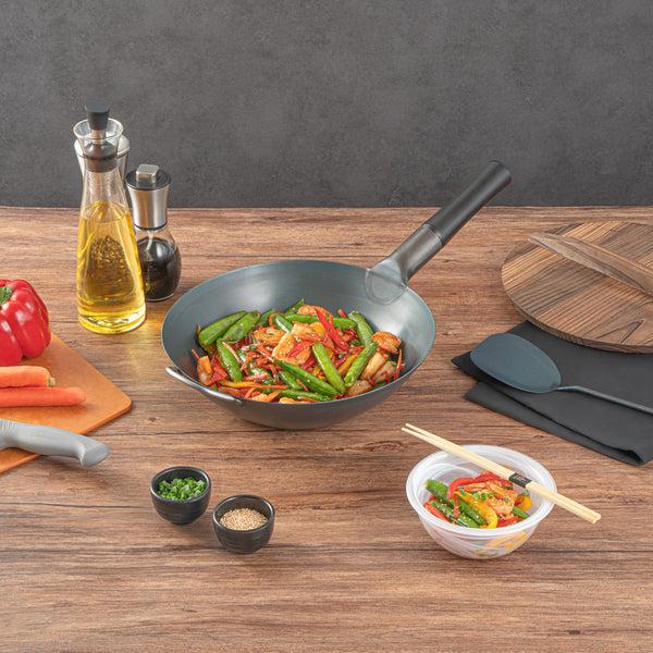 Restaurantware Motomori 12" Black Carbon Steel Flat Bottom Wok / Stir Fry Pan - Pre-seasoned With Wooden Handle - 10 Count Box