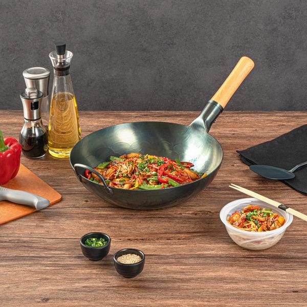 Restaurantware Motomori 12" Blue Carbon Steel Flat Bottom Wok / Stir Fry Pan - Hand Hammered Pre-seasoned With Wooden Handle - 10 Count Box