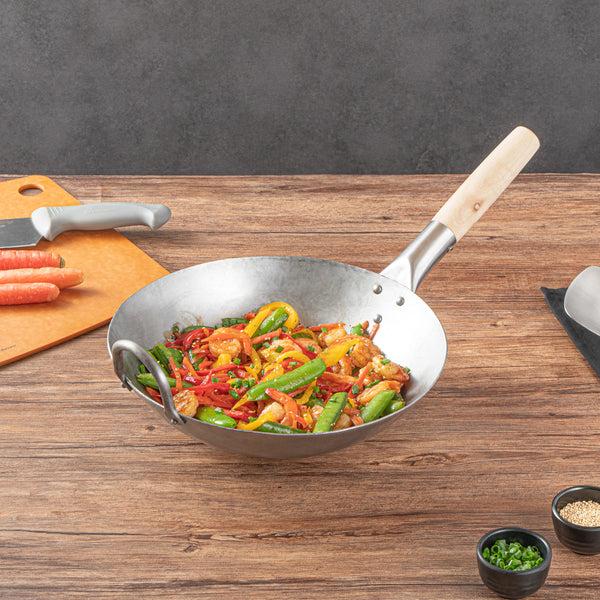 Restaurantware Motomori 12" Carbon Steel Round Bottom Wok / Stir Fry Pan - Hand Hammered With Wooden Handle - 10 Count Box