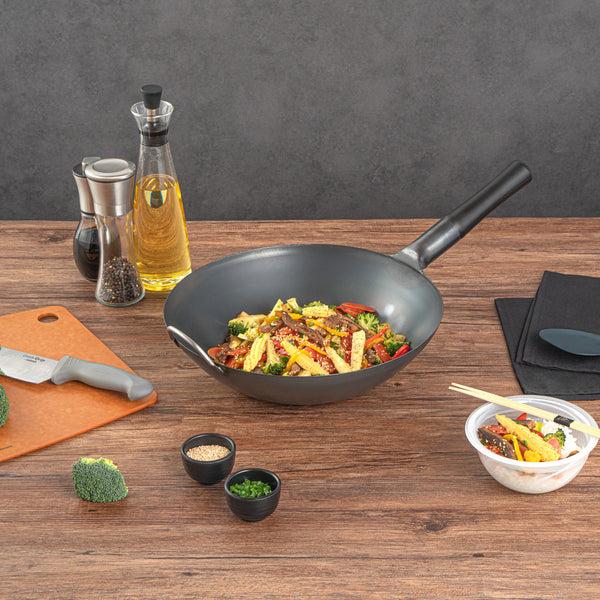 Restaurantware Motomori 14" Black Carbon Steel Flat Bottom Wok / Stir Fry Pan - Pre-seasoned With Wooden Handle - 10 Count Box