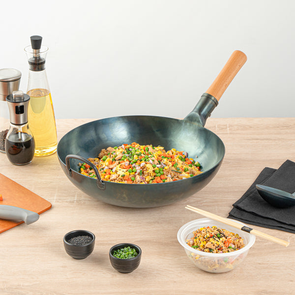 Restaurantware Motomori 14" Blue Carbon Steel Flat Bottom Wok / Stir Fry Pan - Hand Hammered Pre-seasoned With Wooden Handle - 10 Count Box