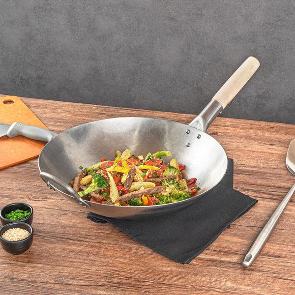 Restaurantware Motomori 14" Carbon Steel Round Bottom Wok / Stir Fry Pan - Hand Hammered With Wooden Handle - 10 Count Box