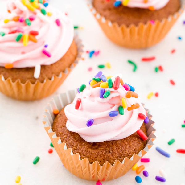 Restaurantware Panificio 0.4 Oz Round Metallic Rose Gold Paper Baking Cup - Foil-Coated - 1 1/4" X 1 1/4" X 3/4" - 200 Count Box