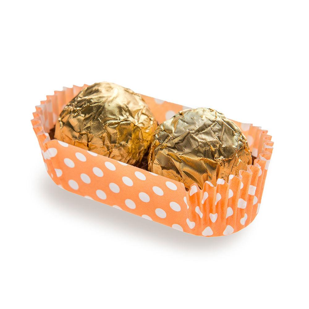 restaurantware Panificio 1 oz Elliptical Polka-Dotted Hot Orange Paper Regular Baking Cup - Ridged - 3 1/2" x 1 1/2" x 3/4" - 200 count box