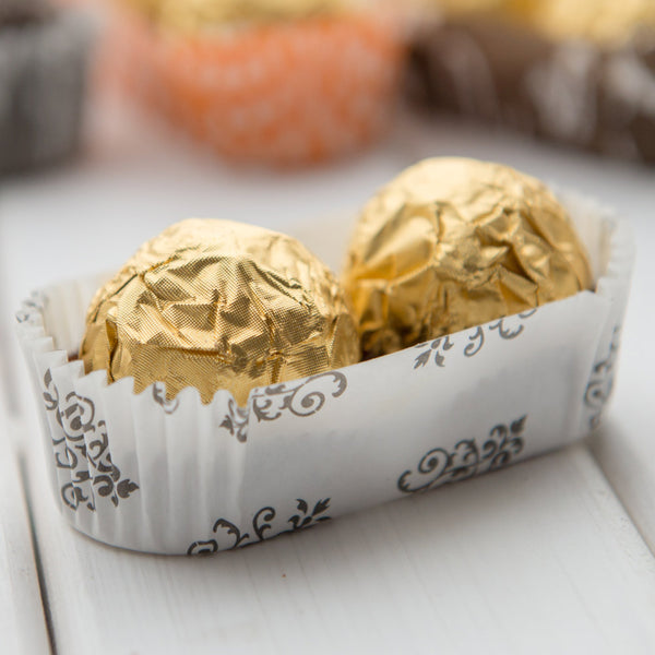 Restaurantware Panificio 1 Oz Elliptical Vintage Floral Paper Regular Baking Cup - Ridged - 3 1/2" X 1 1/2" X 1" - 200 Count Box