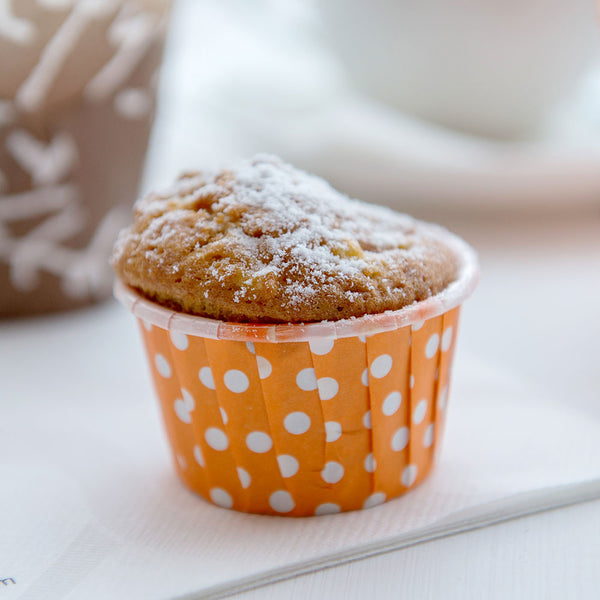 Restaurantware Panificio 1 Oz Round Polka-Dotted Hot Orange Paper Small Baking Cup - Pleated - 2" X 2" X 1 1/4" - 200 Count Box