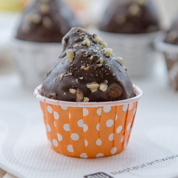 Restaurantware Panificio 2 Oz Round Polka-Dotted Hot Orange Paper Medium Baking Cup - Pleated - 2 1/4" X 2 1/4" X 1 1/2" - 200 Count Box