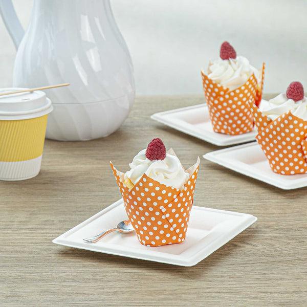 Restaurantware Panificio 2 Oz Tulip Polka-Dotted Hot Orange Paper Tall Baking Cup - 3 1/4" X 3 1/4" X 3 1/2" - 200 Count Box