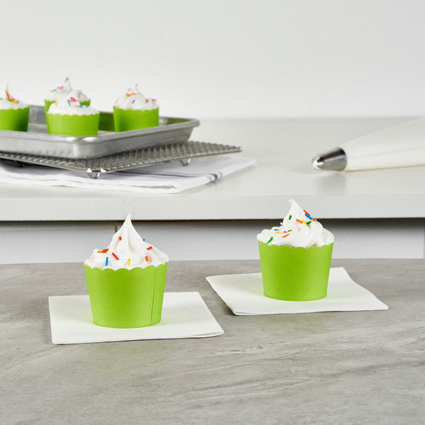 Restaurantware Panificio 3 Oz Round Eco Green Paper Mini Baking Cup - Scalloped - 2 1/2" X 2 1/2" X 1 3/4" - 200 Count Box