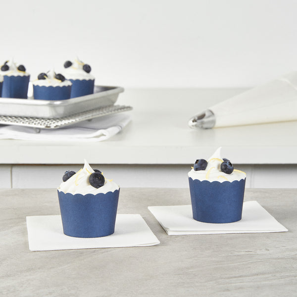 Restaurantware Panificio 3 Oz Round Midnight Blue Paper Mini Baking Cup - Scalloped - 2 1/2" X 2 1/2" X 1 3/4" - 200 Count Box
