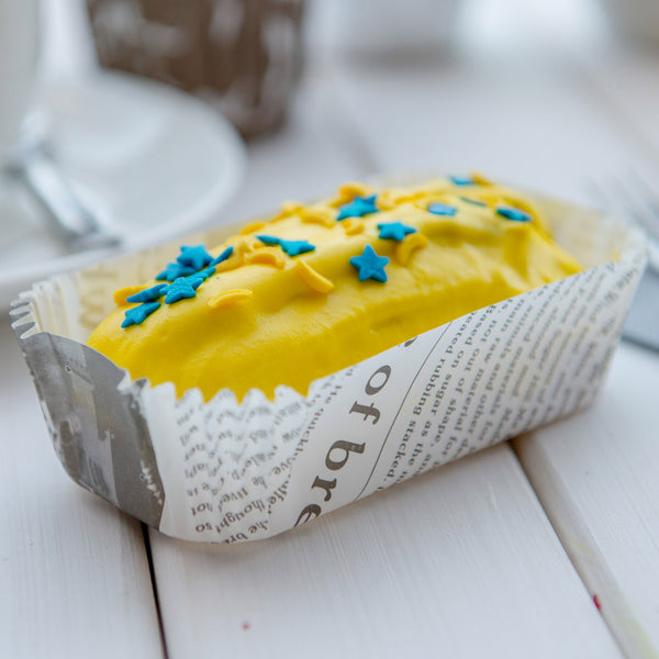 Restaurantware Panificio 5 Oz Elliptical Newsprint Paper Large Baking Cup - Ridged - 4 1/2" X 2 1/2" X 1 1/4" - 200 Count Box